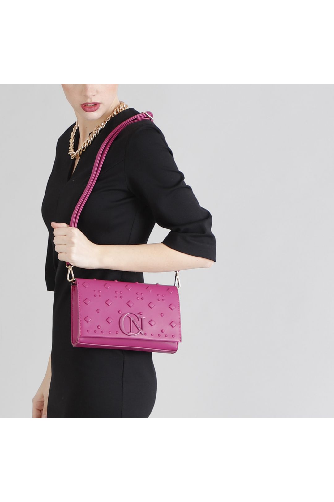 CLUTCH BAG WITH HIGH FREQUENCY DECORATION